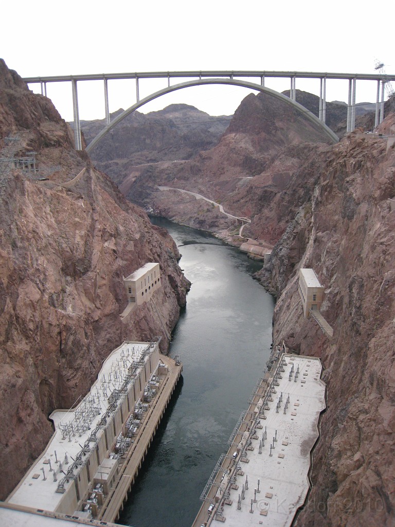 Las Vegas 2010 - Hoover Dam Revisited 0351.JPG - A prolonged dry spell, lasting over a decade, is steadily draining the water sources that power Hoover Dam’s giant turbines and has left Lake Mead at only 41 percent full. The lake has dropped 130 feet since 1999 and is now at 1,084 feet, depths not seen since 1956. The Bureau of Reclamation projects it will shrink another two feet by next month, reaching its lowest elevation since the reservoir was filled in the 1930s.